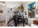 Bright laundry room with washer, dryer, shelving, and a window at 3588 S 257Th Ave, Buckeye, AZ 85326