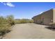 Spacious driveway leads to the house with mountain views and a two-car garage, offering convenience and curb appeal at 36102 N Creek View Ln, Cave Creek, AZ 85331