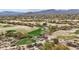 Desert golf course featuring lush green fairways, sand traps and mature landscaping at 36601 N Mule Train Rd # C38, Carefree, AZ 85377