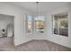 Dining area with bay windows providing lots of natural light at 3830 E Lakewood E Pkwy # 2009, Phoenix, AZ 85048