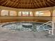 Community hot tub inside a shaded gazebo at 384 Gypsum Dr, Apache Junction, AZ 85119