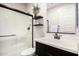 Chic bathroom features a glass shower and modern vanity with decorative plants adding a touch of nature at 4187 N 183Rd Dr, Goodyear, AZ 85395