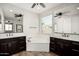 Elegant bathroom with dual vanities, soaking tub, and separate shower for a spa-like experience at 4187 N 183Rd Dr, Goodyear, AZ 85395