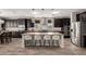 Modern kitchen island with granite countertops, stainless steel appliances, and pendant lighting at 4187 N 183Rd Dr, Goodyear, AZ 85395