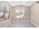 Bright dining area with tile floors, a large window with natural light and neutral wall color at 44321 Cypress Ln, Maricopa, AZ 85138