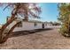 Wide backyard featuring low maintenance landscaping, providing a blank canvas for outdoor activities at 4720 N 63Rd Ave, Phoenix, AZ 85033