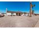 Charming home with a desert rock yard, stone accents, covered entry and attached garage at 4720 N 63Rd Ave, Phoenix, AZ 85033