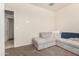 Living room features a large sectional couch and a doorway to another room at 5180 E Diatomite Dr, San Tan Valley, AZ 85143