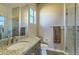 Modern bathroom with granite countertop, single sink, and tiled shower with glass door at 5237 E Montgomery Rd, Cave Creek, AZ 85331