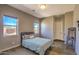 Cozy bedroom with natural light, wood flooring, and neutral tones at 5237 E Montgomery E Rd, Cave Creek, AZ 85331