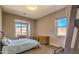 Bedroom featuring wood floors, two windows and natural lighting at 5237 E Montgomery Rd, Cave Creek, AZ 85331