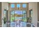 Dining room with large sliding glass doors providing scenic views of the backyard and pool at 5237 E Montgomery E Rd, Cave Creek, AZ 85331