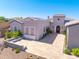 Beautiful single-story home features a tile roof, desert landscaping, and paved entryway at 5237 E Montgomery E Rd, Cave Creek, AZ 85331