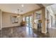 Bright living room featuring tile flooring, large windows, and seamless access to the outdoor space at 5237 E Montgomery Rd, Cave Creek, AZ 85331