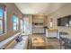 Bright living room with natural light, a modern couch and hardwood floors at 5237 E Montgomery Rd, Cave Creek, AZ 85331