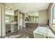 Luxurious main bathroom featuring dual vanities, a soaking tub, and plenty of natural light at 5237 E Montgomery Rd, Cave Creek, AZ 85331