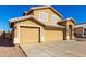 Charming two-story home featuring a three car garage and appealing desert landscaping at 8626 W Las Palmaritas Dr, Peoria, AZ 85345