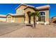 Charming two-story home featuring a three car garage and appealing desert landscaping at 8626 W Las Palmaritas Dr, Peoria, AZ 85345