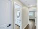 Modern bathroom with a white vanity, blue-framed mirror, and elegant fixtures at 8637 E Mulberry St, Scottsdale, AZ 85251