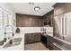 Stylish kitchen featuring shaker cabinets, quartz countertops, and stainless steel appliances at 977 E Saratoga St, Gilbert, AZ 85296