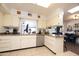 Spacious kitchen with stainless steel appliances, tile flooring and skylight for natural light at 10106 W Highwood Ln, Sun City, AZ 85373