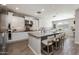 Stylish kitchen featuring a large island with seating and modern stainless steel appliances at 10547 E Relativity Ave, Mesa, AZ 85212