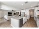 Open-concept kitchen and living area creating an inviting and connected living space at 10547 E Relativity Ave, Mesa, AZ 85212