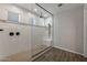 Walk-in shower features white subway tile, mosaic accents, and a built-in bench at 10547 E Relativity Ave, Mesa, AZ 85212