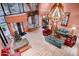 View of a bright and welcoming lobby with tile floors, comfortable seating, and a festive Christmas tree at 12222 N Paradise Village S Pkwy # 405, Phoenix, AZ 85032