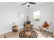 Home office showcases desk, globe, comfortable chair, and natural lighting at 13314 W Dale Ln, Peoria, AZ 85383