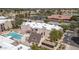 Aerial view of the community featuring the landscaping and community pool at 1340 N Recker Rd # 254, Mesa, AZ 85205