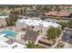 Aerial view of community featuring the pool and landscaping at 1340 N Recker Rd # 254, Mesa, AZ 85205