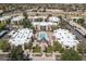 Aerial view of the community featuring landscaping and community pool at 1340 N Recker Rd # 254, Mesa, AZ 85205