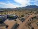 Expansive desert property with a custom home, mature landscaping, and mountain views at 13935 E Smokehouse Trl, Scottsdale, AZ 85262