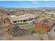 Aerial view of the property highlighting the home's modern design and unique backyard at 13935 E Smokehouse Trl, Scottsdale, AZ 85262