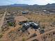 Wide aerial view of the desert estate showing the surrounding area at 13935 E Smokehouse Trl, Scottsdale, AZ 85262