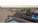 Overhead view of the backyard landscaping, featuring a spa, metal art, and desert surroundings at 13935 E Smokehouse Trl, Scottsdale, AZ 85262