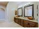 Bathroom vanity with granite countertop and vessel sinks at 13935 E Smokehouse Trl, Scottsdale, AZ 85262