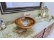 Bathroom sink with decorative bowl and faucet, set on a granite countertop at 13935 E Smokehouse Trl, Scottsdale, AZ 85262