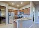 Modern kitchen featuring stainless steel appliances, granite counters, and ample cabinetry for storage at 13935 E Smokehouse Trl, Scottsdale, AZ 85262