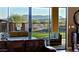 Inviting living room featuring glass sliding doors with a view to the outdoor living space and the mountain landscape at 13935 E Smokehouse Trl, Scottsdale, AZ 85262