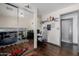 Second bedroom with a loft bed, desk, and a closet with mirrored sliding doors at 1755 W Lawrence Ln, Phoenix, AZ 85021