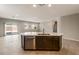 Bright and airy kitchen with a center island and stainless steel appliances at 17842 W Getty Dr, Goodyear, AZ 85338