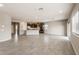 Spacious living area featuring tile floors and lots of natural light at 17842 W Getty Dr, Goodyear, AZ 85338