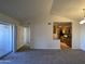 Bright living room showing a glimpse into the kitchen at 200 E Southern Ave # 348, Tempe, AZ 85282