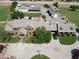 Brick home with a well-manicured lawn, mature trees, barn and circular driveway at 2025 S Val Vista Dr, Gilbert, AZ 85295