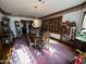 Elegant dining room with hardwood floors, a chandelier, and ornate china cabinets at 2025 S Val Vista Dr, Gilbert, AZ 85295