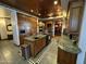 Gourmet kitchen featuring granite countertops, tile floors, and center island at 2025 S Val Vista Dr, Gilbert, AZ 85295