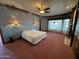 Large main bedroom with a ceiling fan, fireplace and ensuite at 2025 S Val Vista Dr, Gilbert, AZ 85295