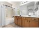 Bathroom featuring double sinks and a shower-tub combination at 20840 E Vía Del Palo --, Queen Creek, AZ 85142